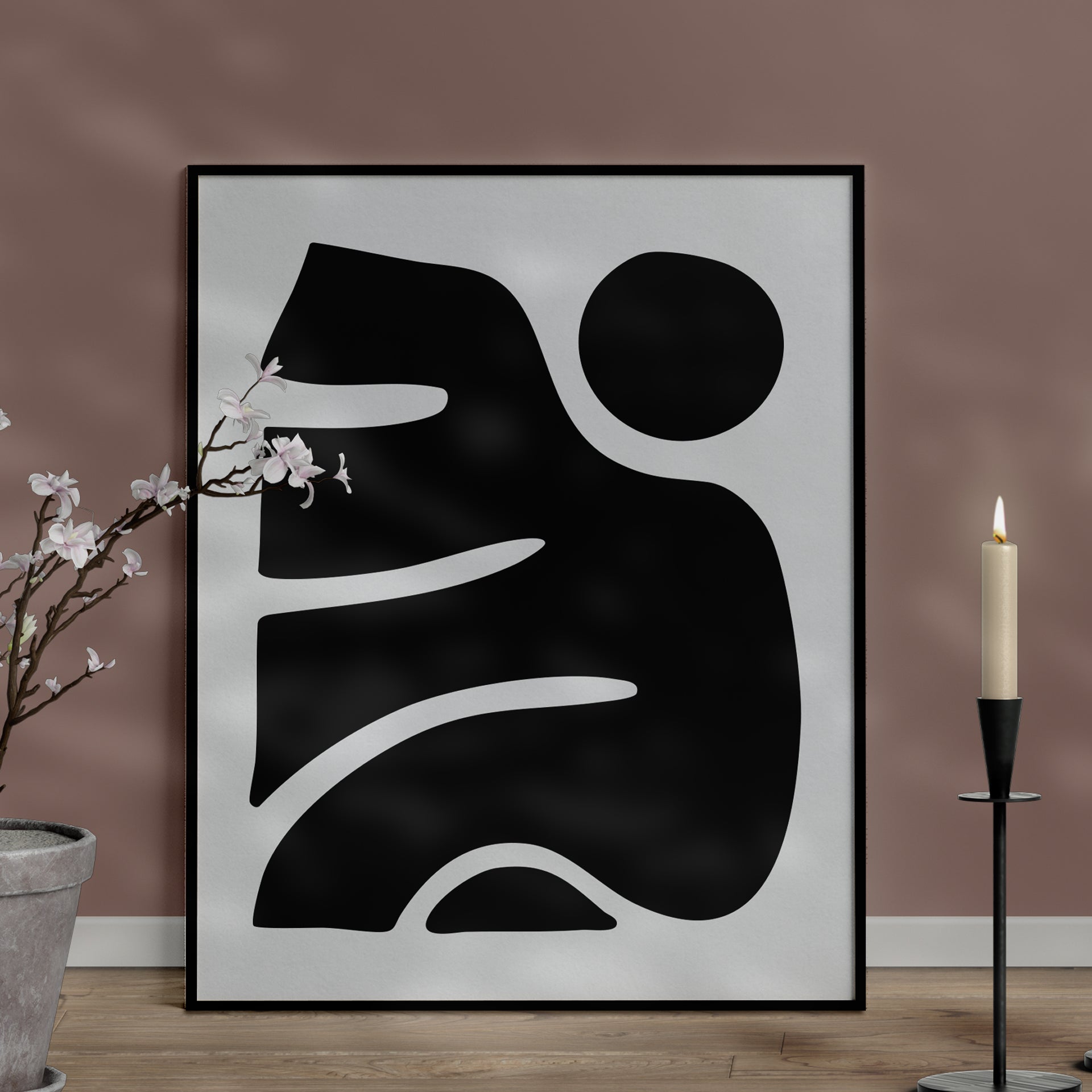 Besma 2 luxury modern abstract art print – museum-quality framed artwork for contemporary interiors. Shown as a print in black frame sitting against a wall with lamp and vase in foreground.