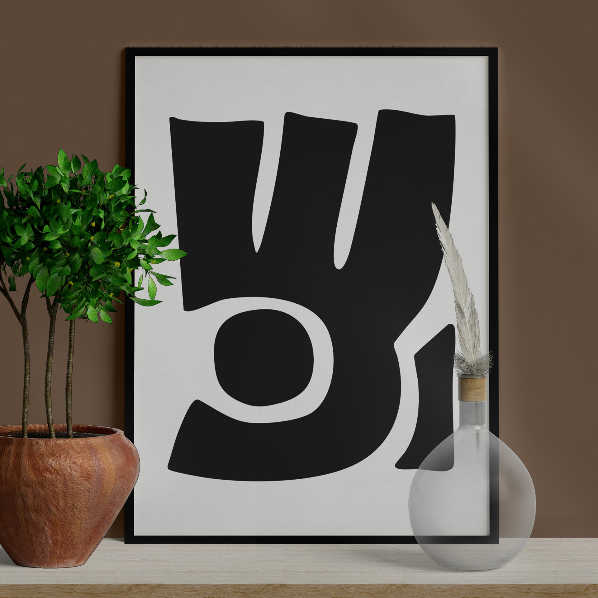 Besma 3 luxury modern abstract art print – museum-quality framed artwork for contemporary interiors. Shown as a print in black frame sitting against a wall with lamp and vase in foreground.