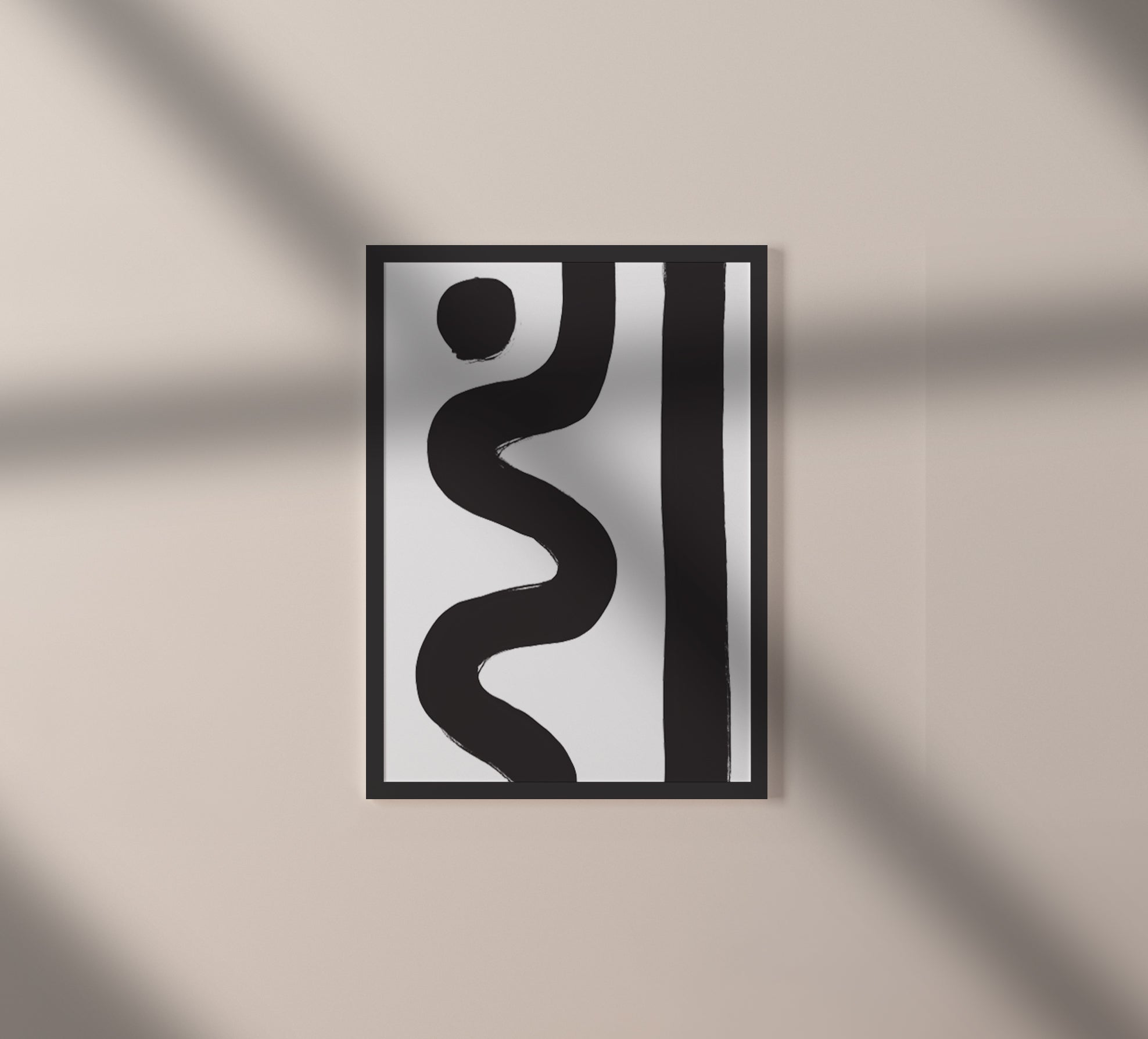 Ebb & Line 2 – luxury modern abstract art print in black and white with black wood frame. Shown as an individual print on a black frame against a light beige wall with shadows cast across it.