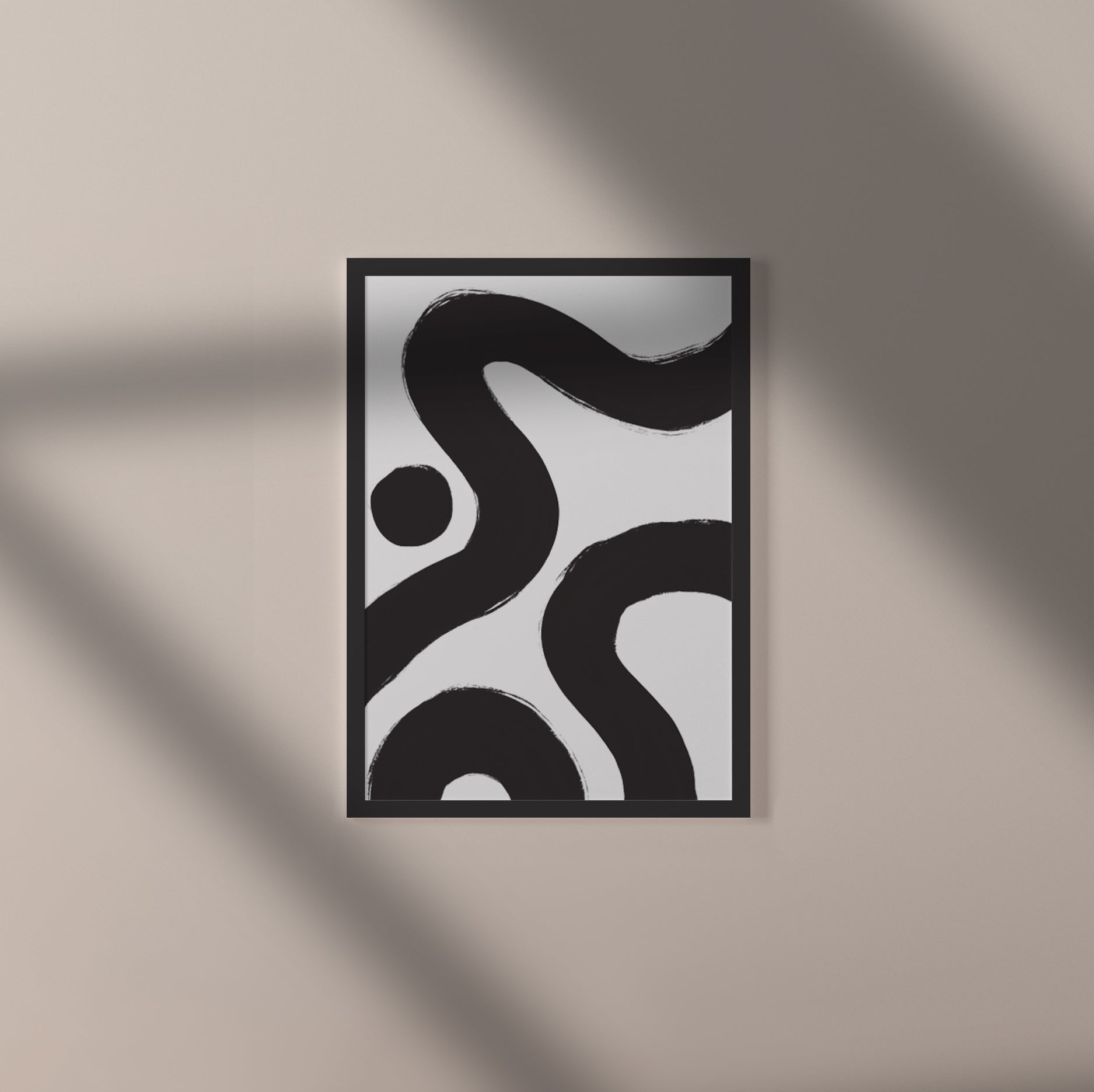 Ebb & Line 3 – luxury modern abstract art print in black and white with black wood frame. Shown as an individual print on a black frame against a light beige wall with shadows cast across it.